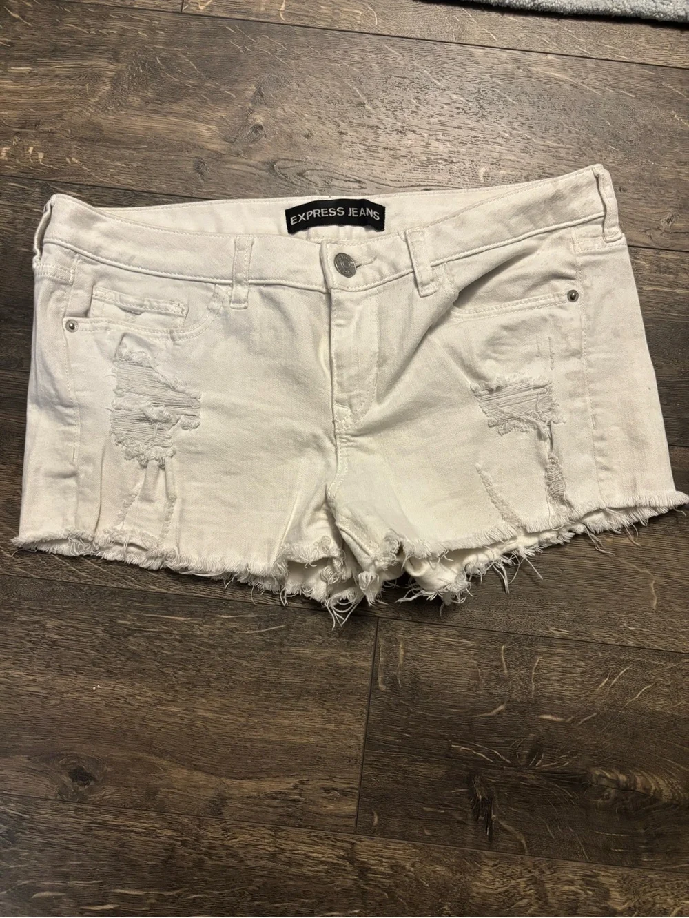 Express white distressed shorts